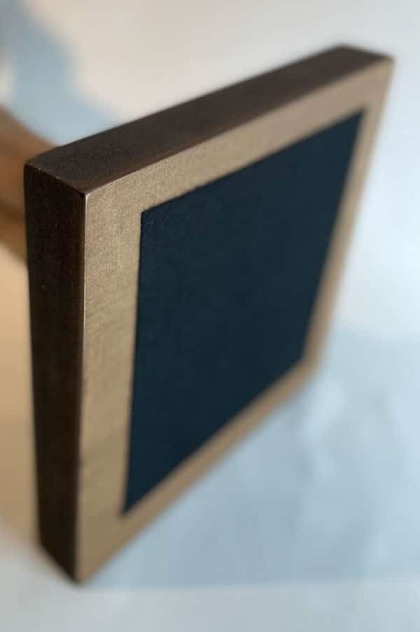 wood base with felt cover